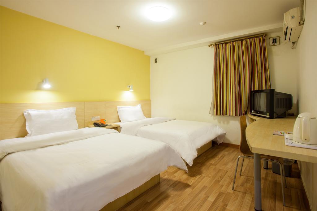 7Days Inn Qingdao Liuting Airport Номер фото