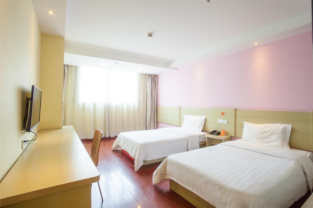 7Days Inn Qingdao Liuting Airport Номер фото